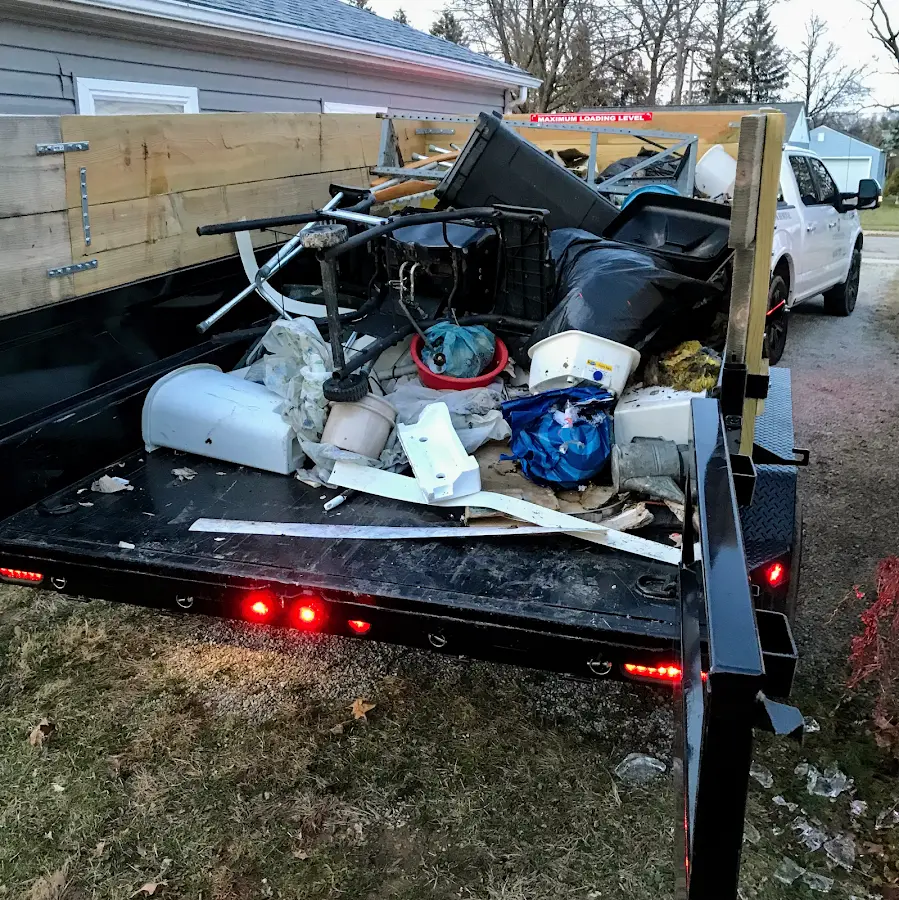 Roll-off dumpster delivered to a residential driveway in St. Marys